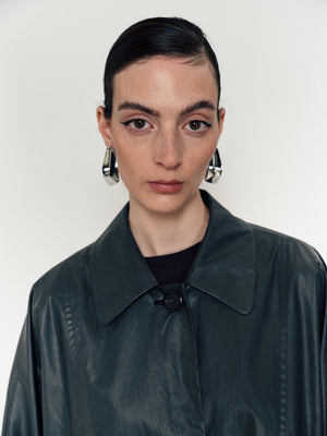 Oversized loose coat with oil-like wax leather coating